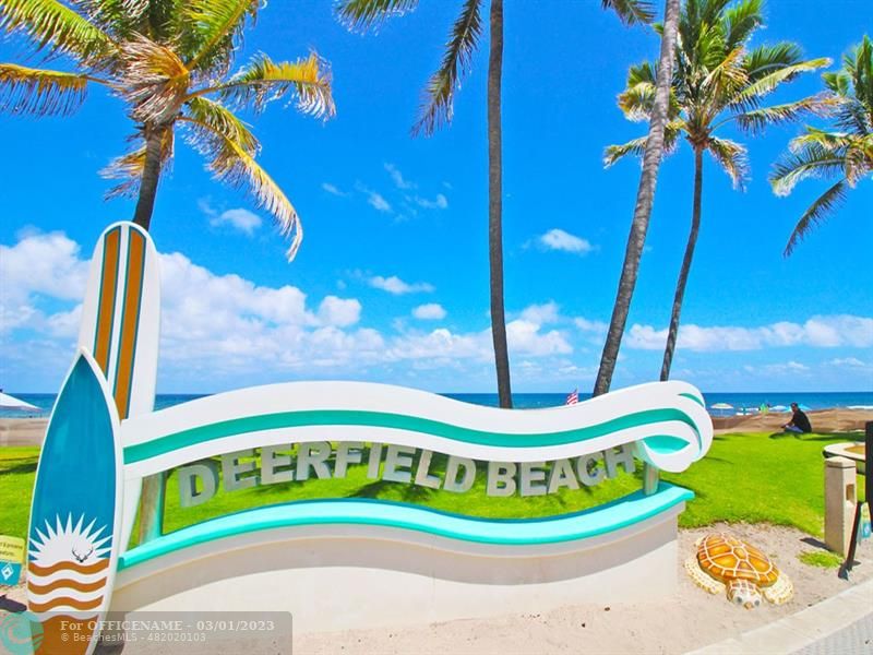 1055 Cambridge C, Unit 1055 Deerfield Beach, FL 33442 - Photo 28 of 52 a front view of a house with a yard