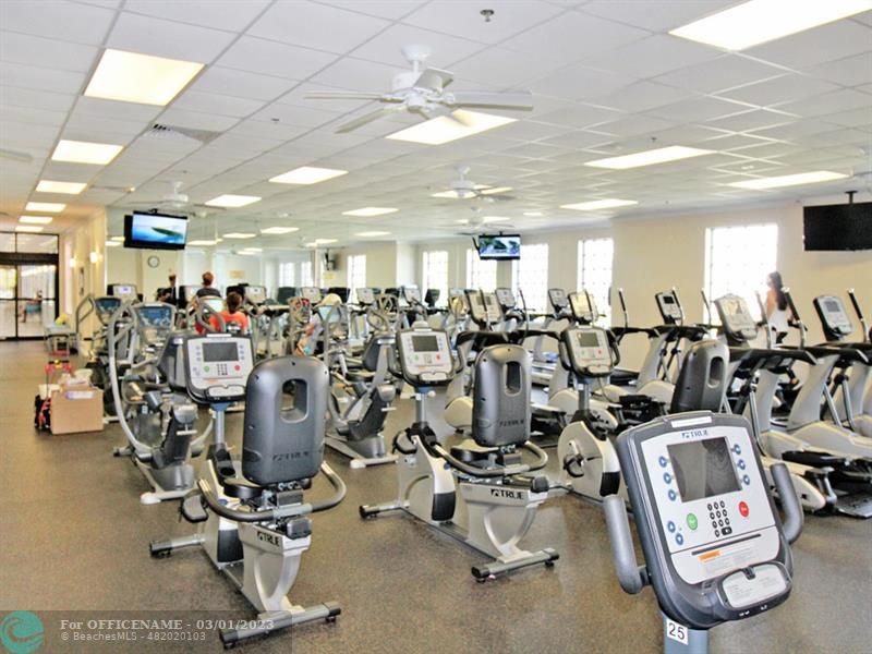 1055 Cambridge C, Unit 1055 Deerfield Beach, FL 33442 - Photo 40 of 52 a view of a room with gym equipment