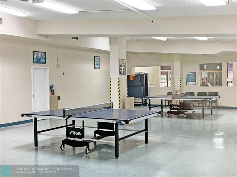 1055 Cambridge C, Unit 1055 Deerfield Beach, FL 33442 - Photo 48 of 52 a view of a livingroom with furniture