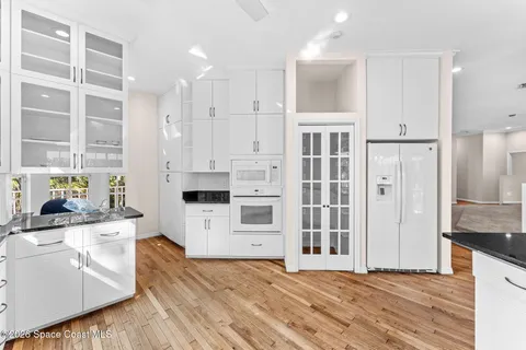 a kitchen with sink and window