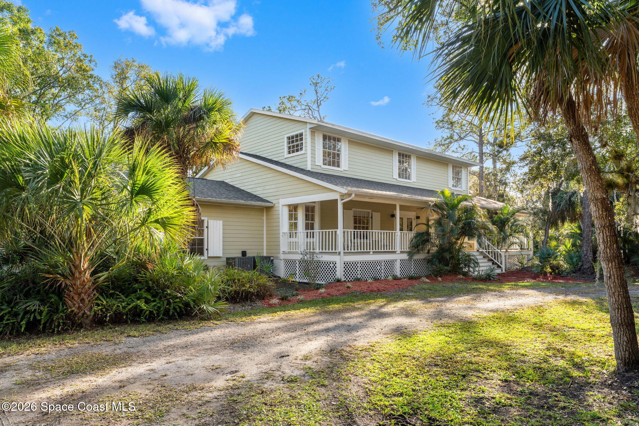 1325 Chase Hammock Road Merritt Island, FL 32953 - Photo 82 of 83 a front view of house with yard and green space