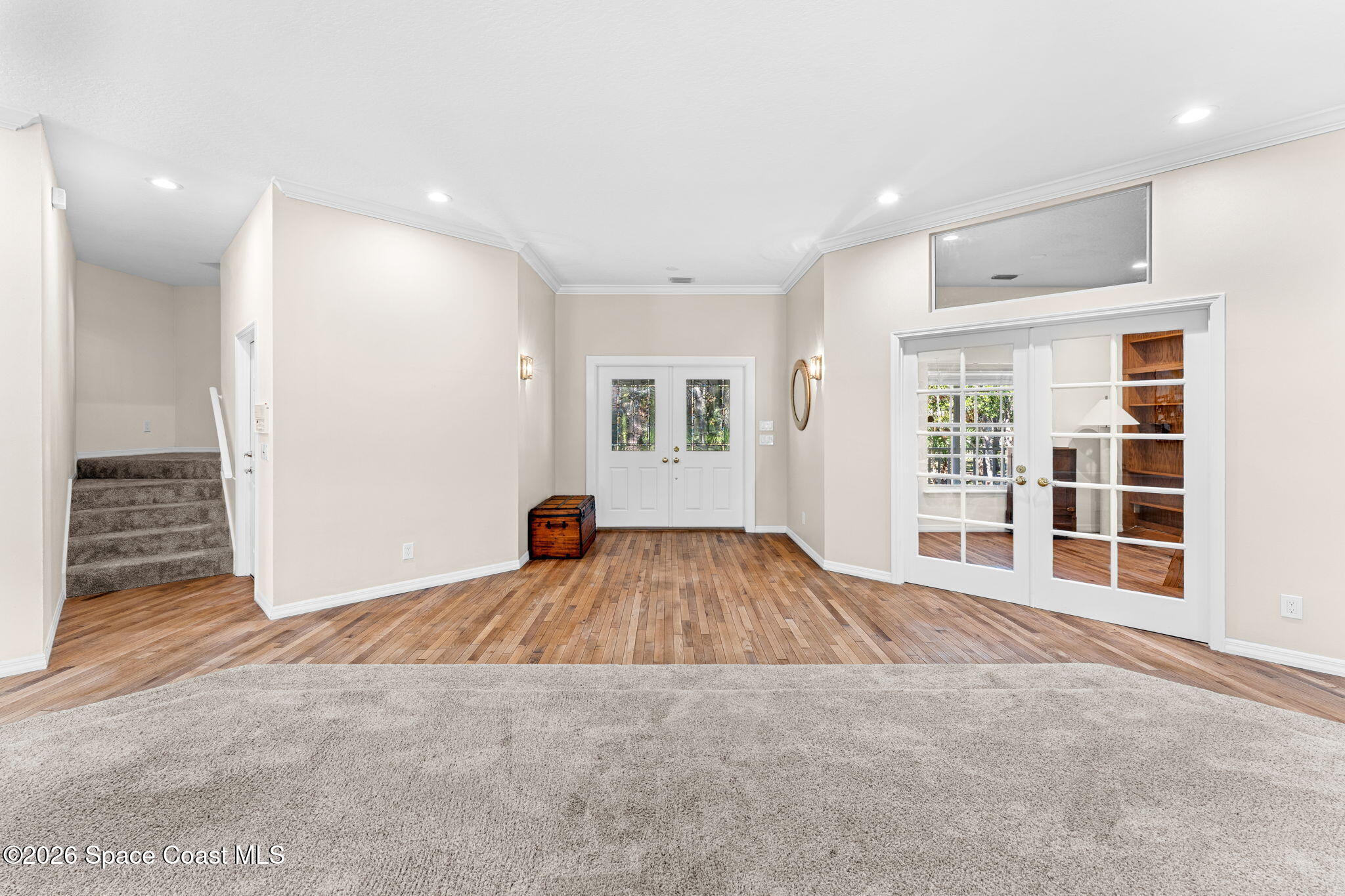 1325 Chase Hammock Road Merritt Island, FL 32953 - Photo 9 of 83 an empty room with windows and closet