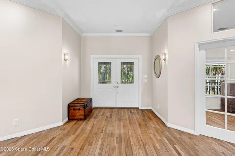 a view of an empty room with a fireplace