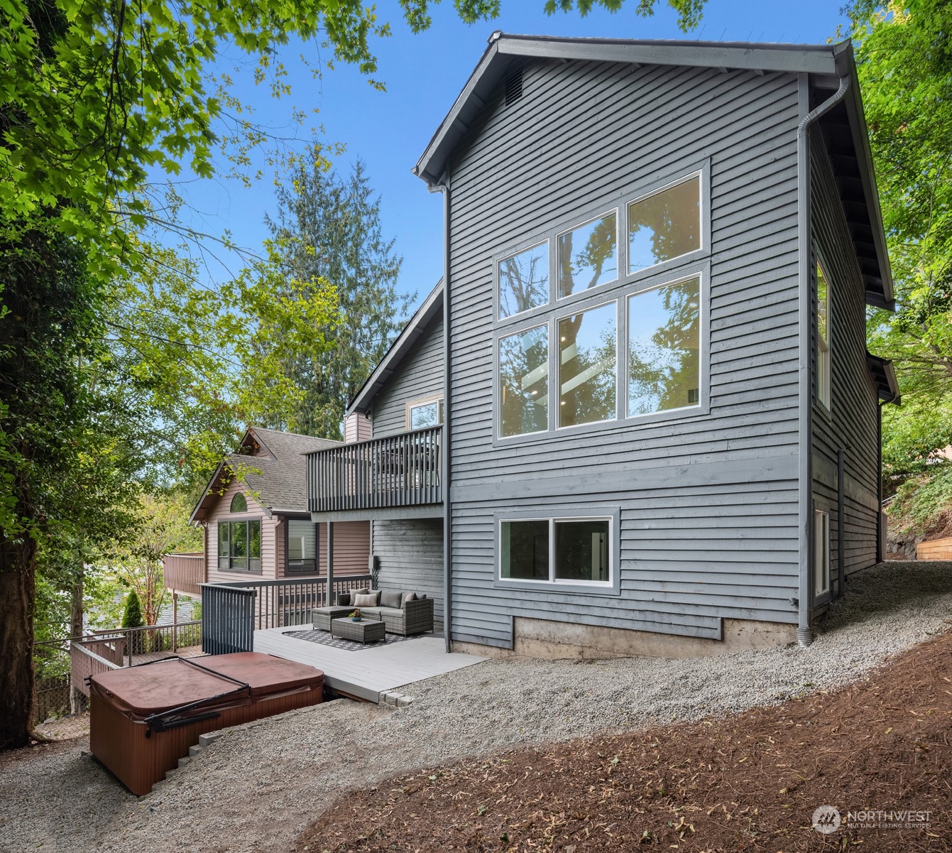 2375 Northeast 90th Street Seattle, WA 98115 - Photo 25 of 27 a view of a house with a yard and sitting area