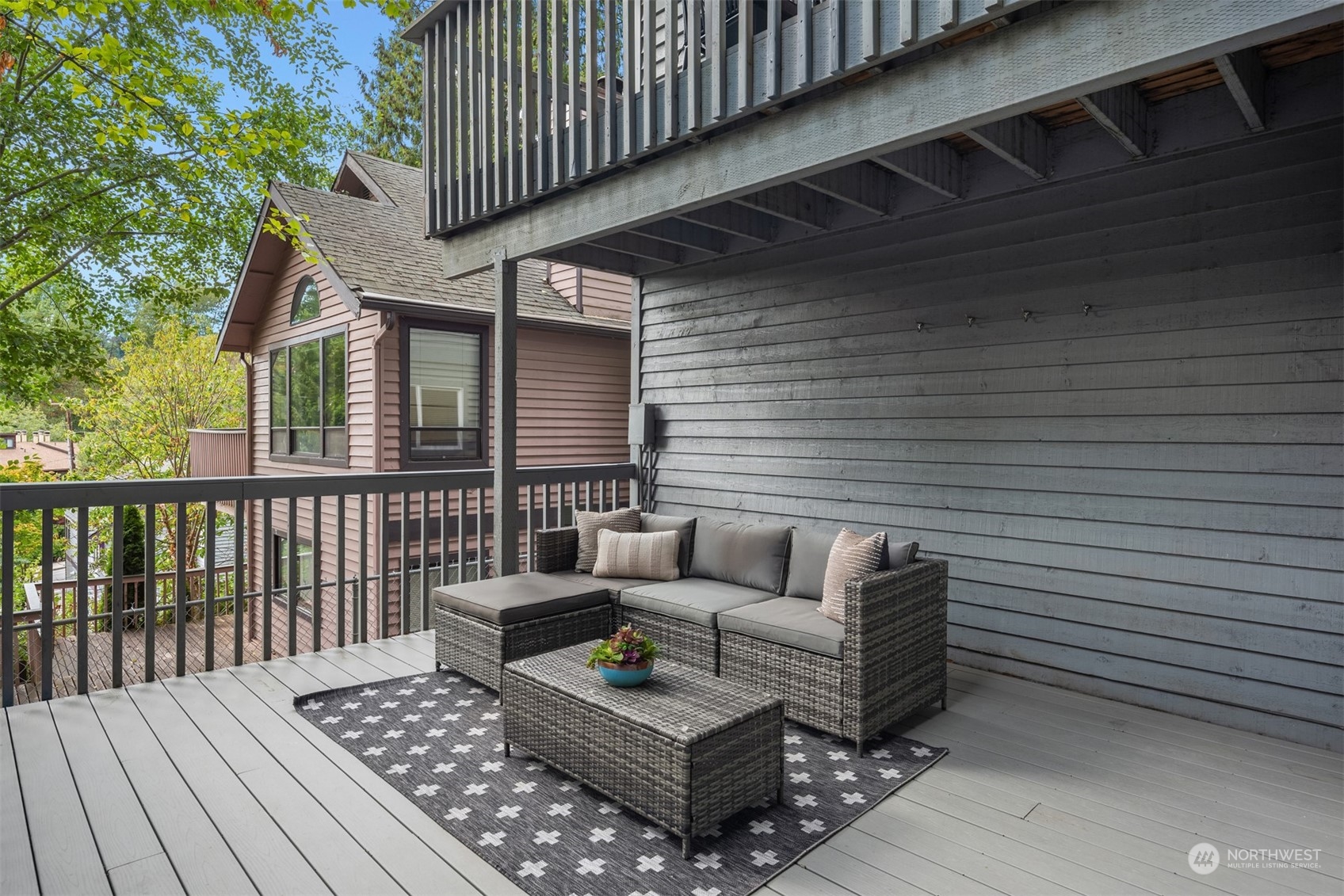 2375 Northeast 90th Street Seattle, WA 98115 - Photo 26 of 27 a view of a patio with couches chairs and wooden floor
