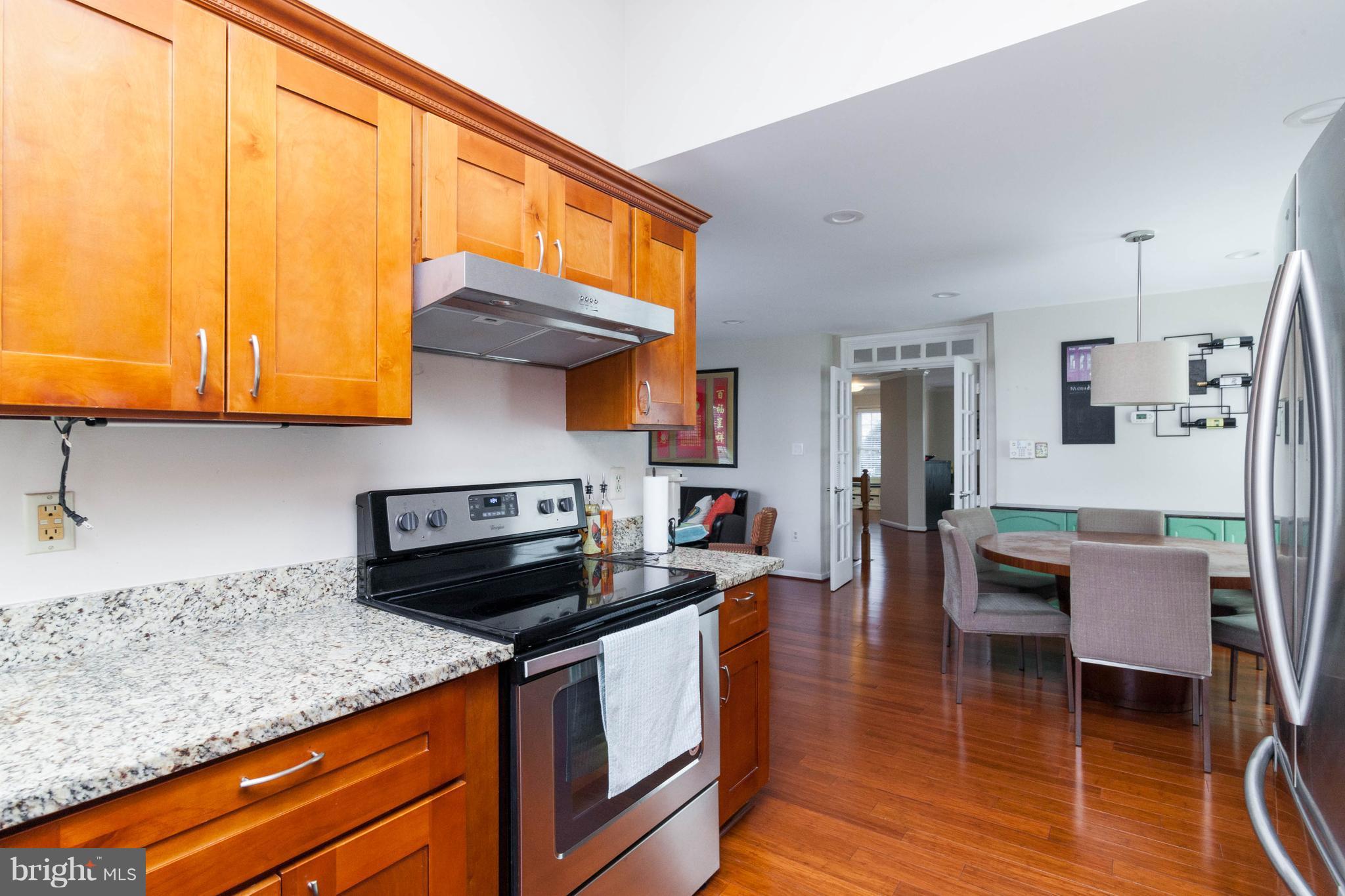 6586 Forsythia Street Springfield, VA 22150 - Photo 12 of 30 Kitchen with view to breakfast room