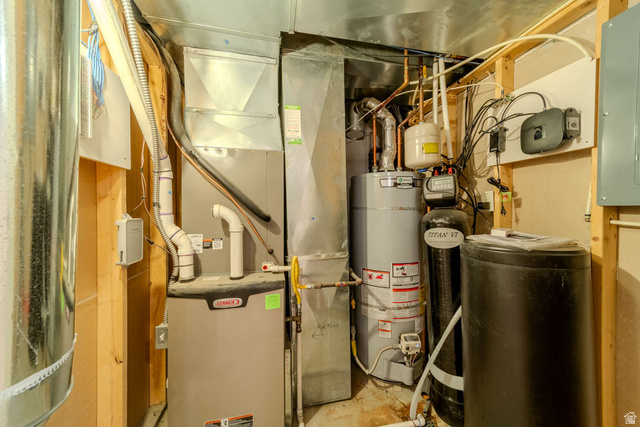 598 Hollow Creek Road Draper, UT 84020 - Photo 56 of 110 Dedicated utility area featuring a Lennox furnace, hot water heater, and water filtration system