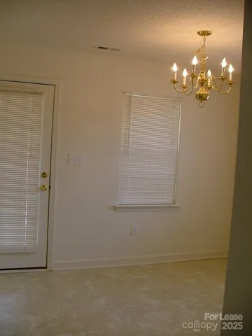 a view of a chandelier fan