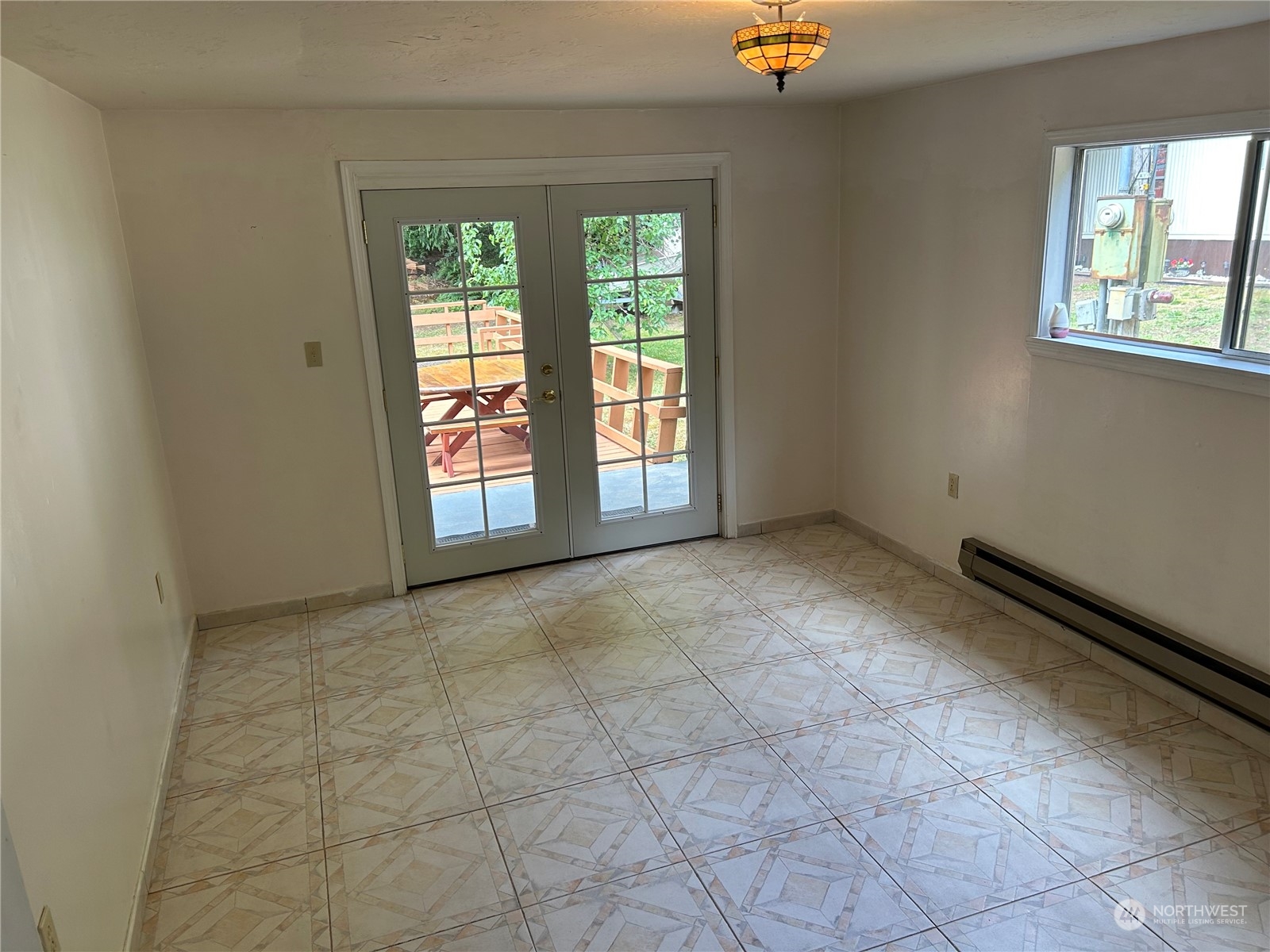 41 Cove Way Brinnon, WA 98320 - Photo 12 of 39 an empty room with windows