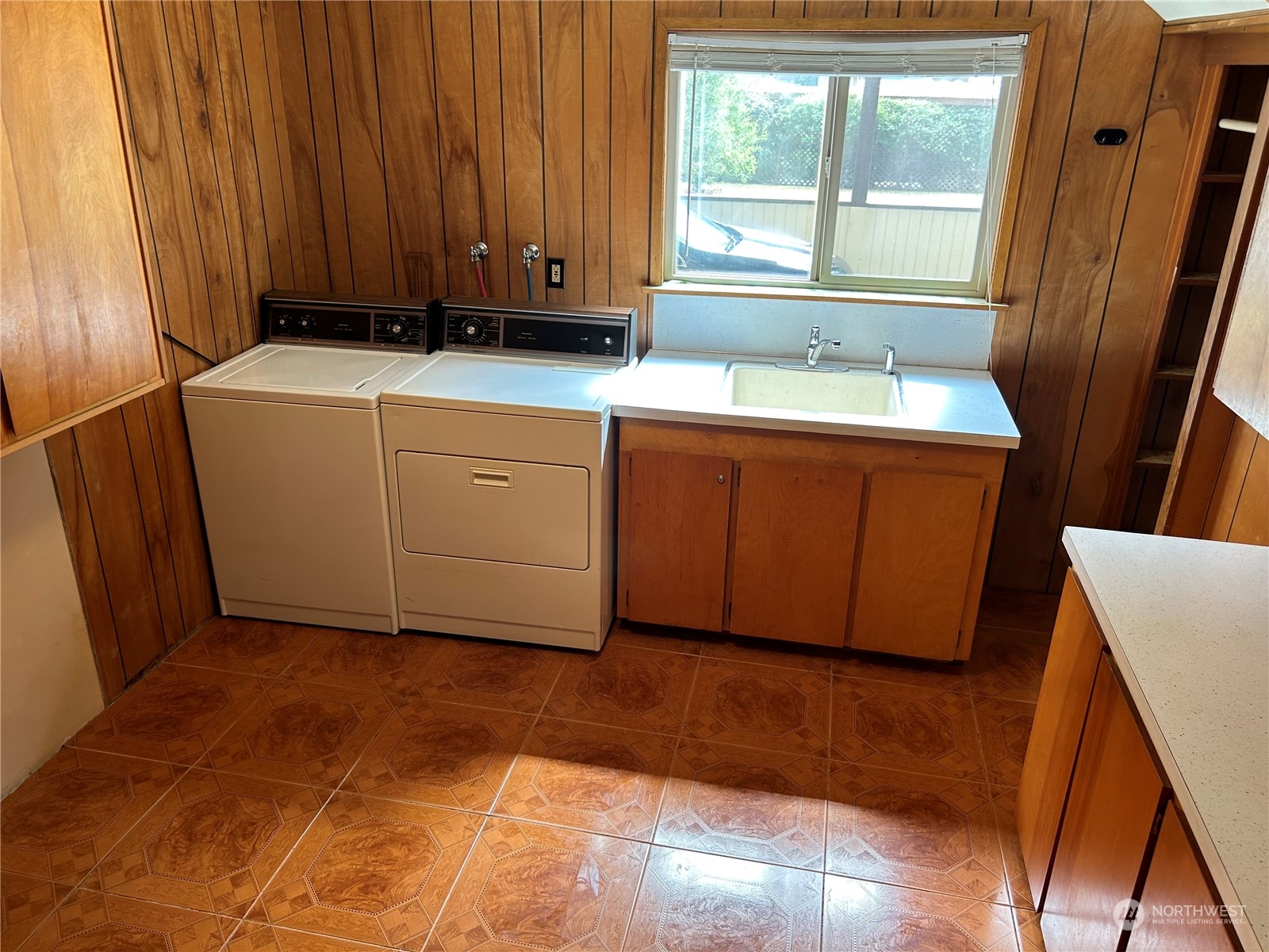 41 Cove Way Brinnon, WA 98320 - Photo 21 of 39 a room with window and washer dryer