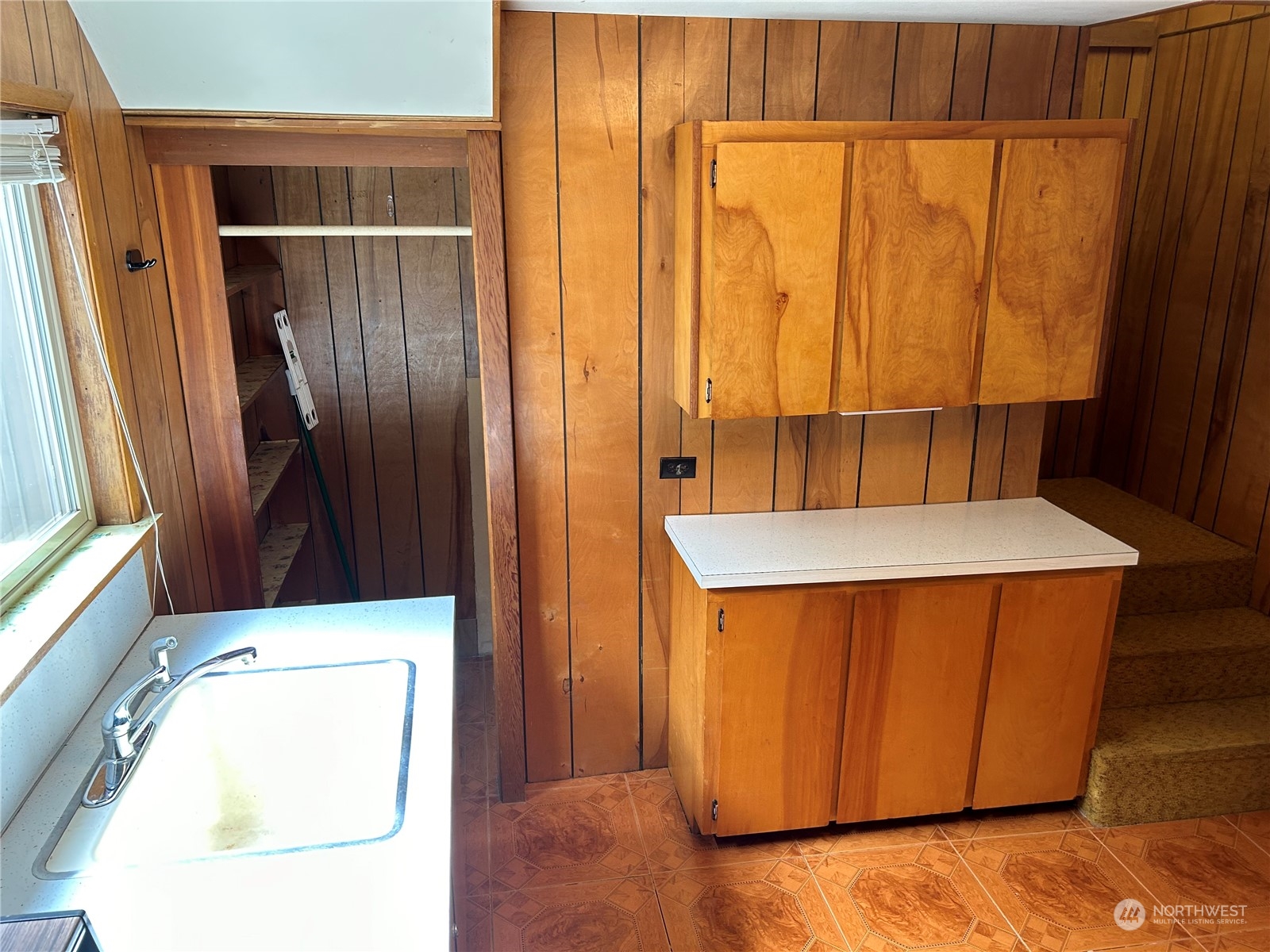 41 Cove Way Brinnon, WA 98320 - Photo 22 of 39 a kitchen with a refrigerator and a stove
