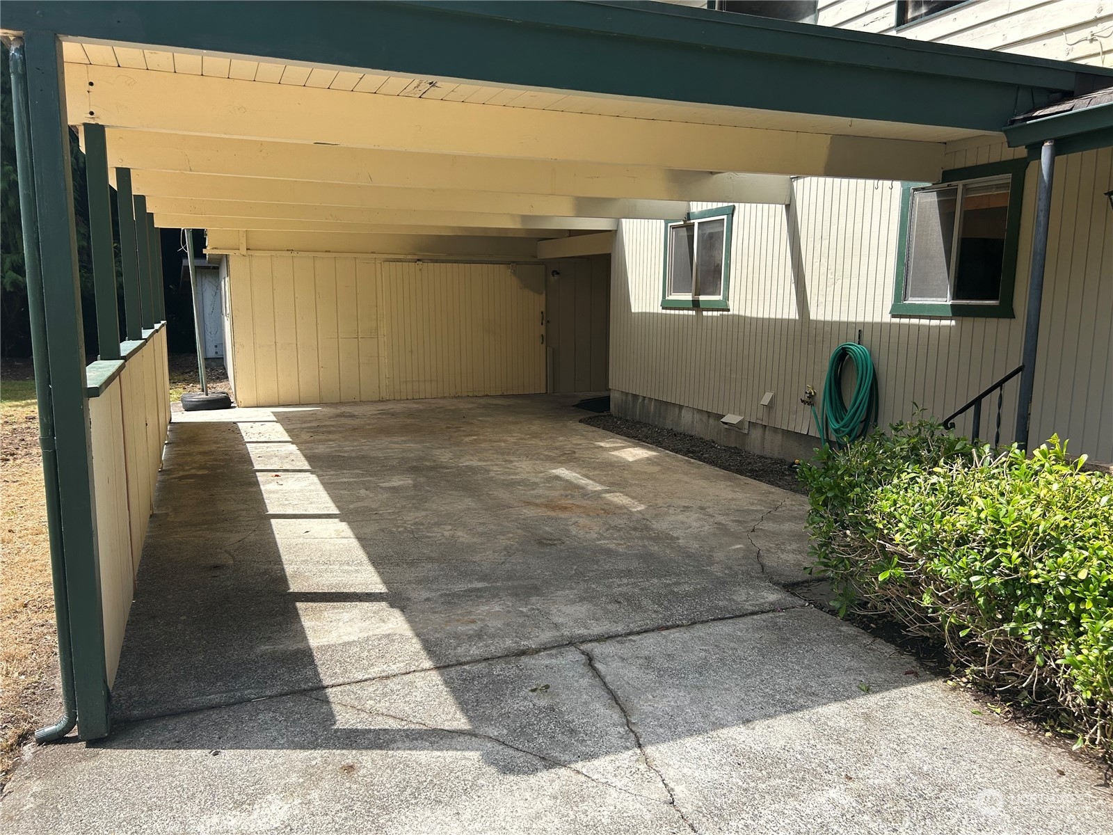 41 Cove Way Brinnon, WA 98320 - Photo 26 of 39 a view of a house with a backyard