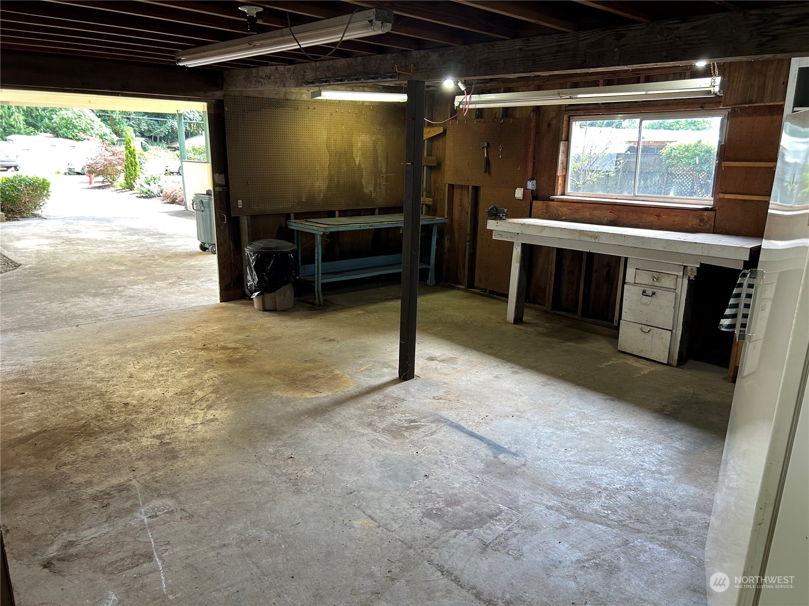 41 Cove Way Brinnon, WA 98320 - Photo 27 of 39 a view of an empty room with a flat screen tv