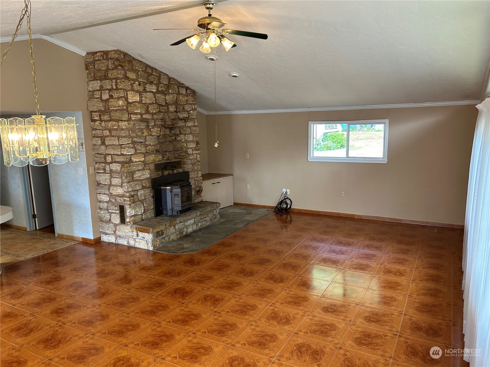 41 Cove Way Brinnon, WA 98320 - Photo 7 of 39 a view of empty room with a fireplace