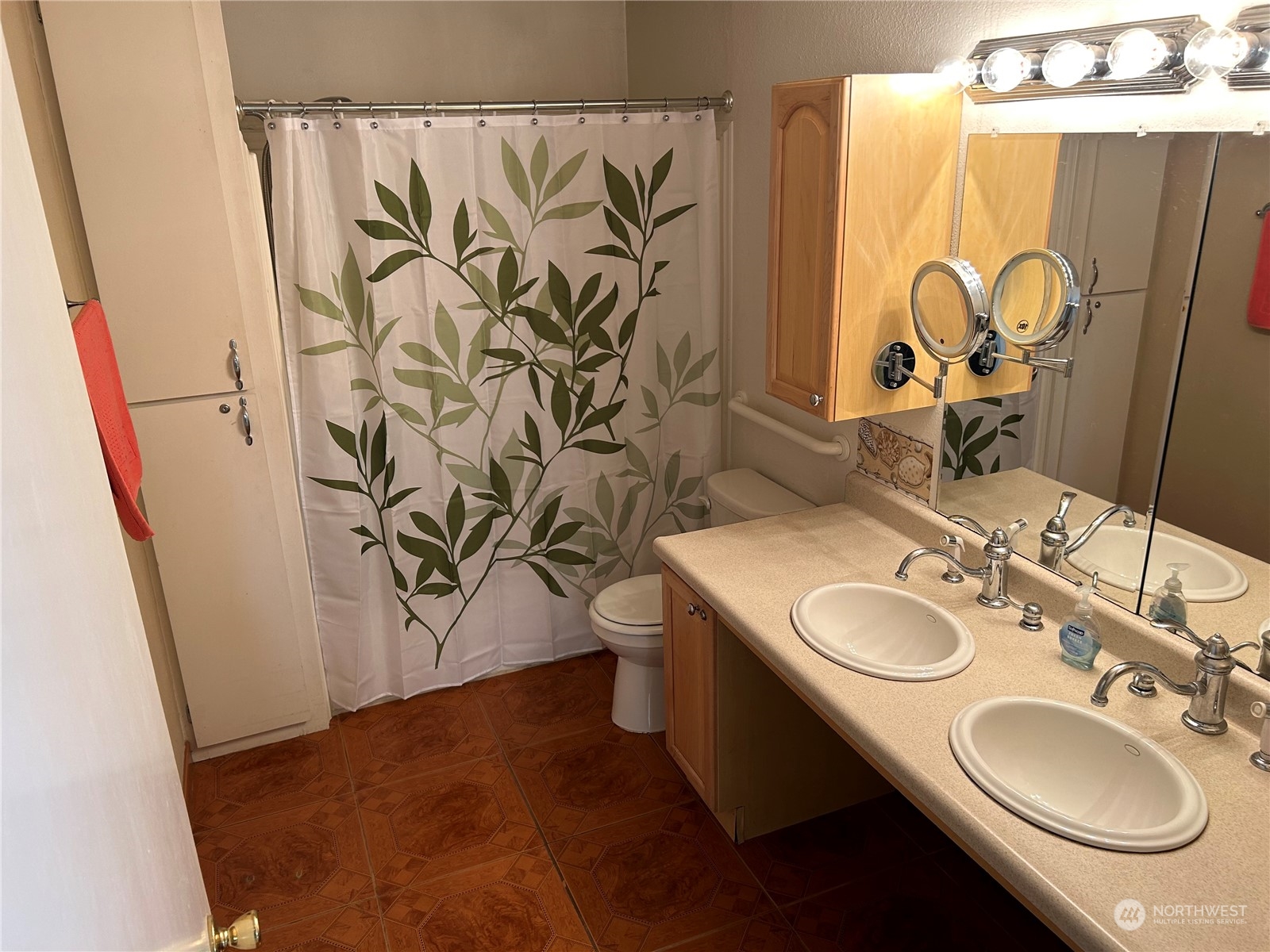 41 Cove Way Brinnon, WA 98320 - Photo 10 of 39 a bathroom with a sink and a mirror