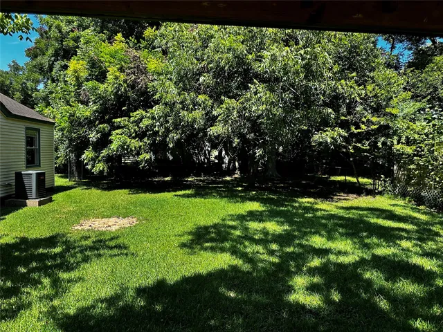 a view of a backyard with a garden