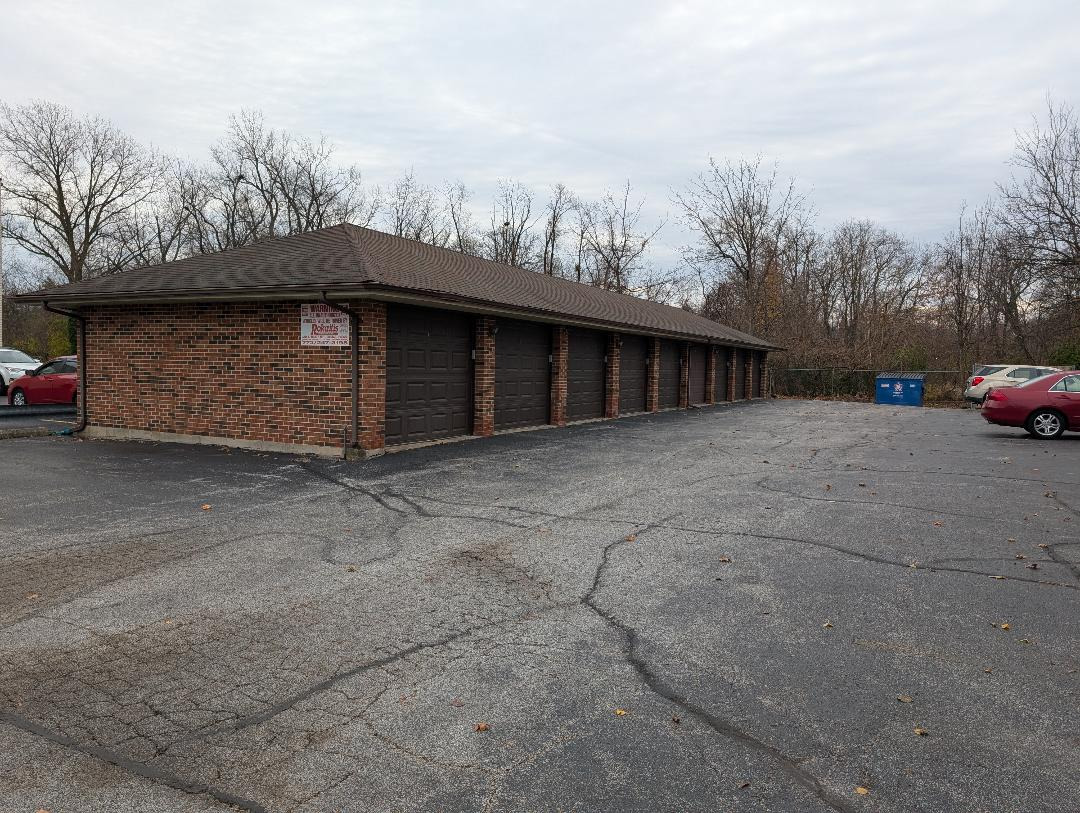 5723 129th Street, Unit 7F Crestwood, IL 60418 - Photo 12 of 12 a house with trees in the background