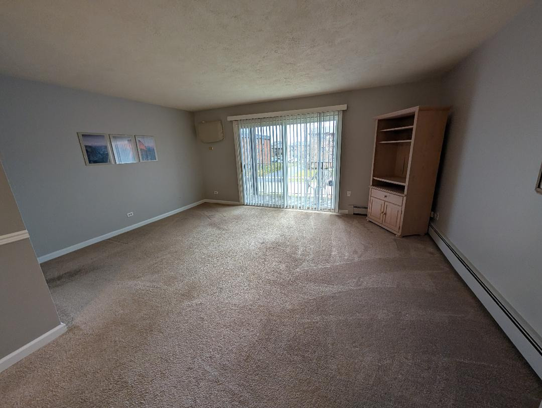 5723 129th Street, Unit 7F Crestwood, IL 60418 - Photo 10 of 12 an empty room with windows