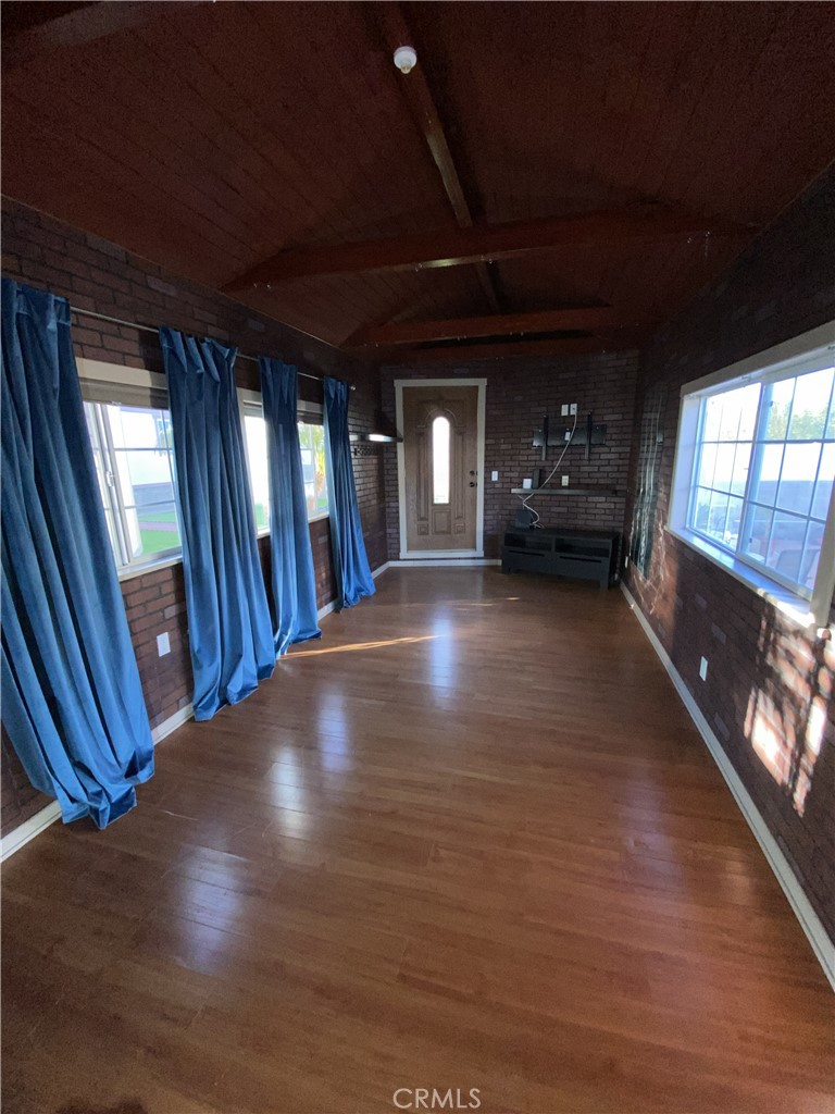 10535 Samoa Avenue Tujunga, CA 91042 - Photo 18 of 25 a view of livingroom with furniture and windows