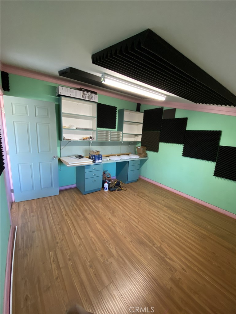 10535 Samoa Avenue Tujunga, CA 91042 - Photo 20 of 25 a view of kitchen and wooden floor