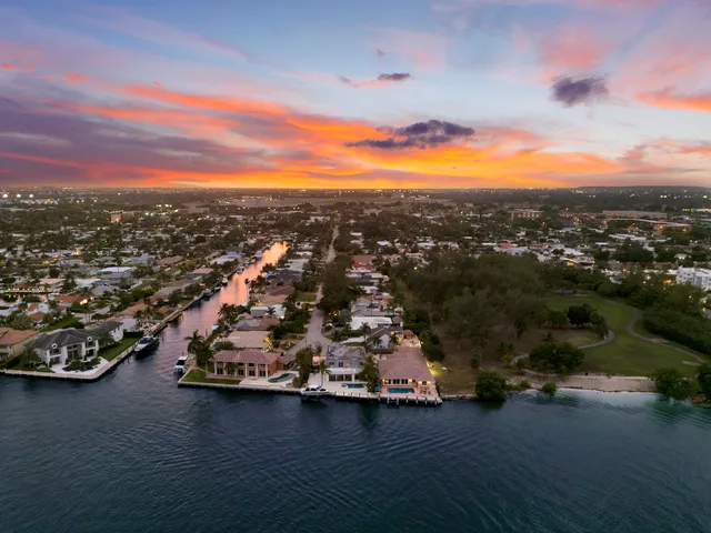 a balcony with furniture and wooden floor