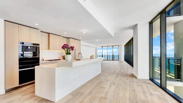 a kitchen with a sink and a window