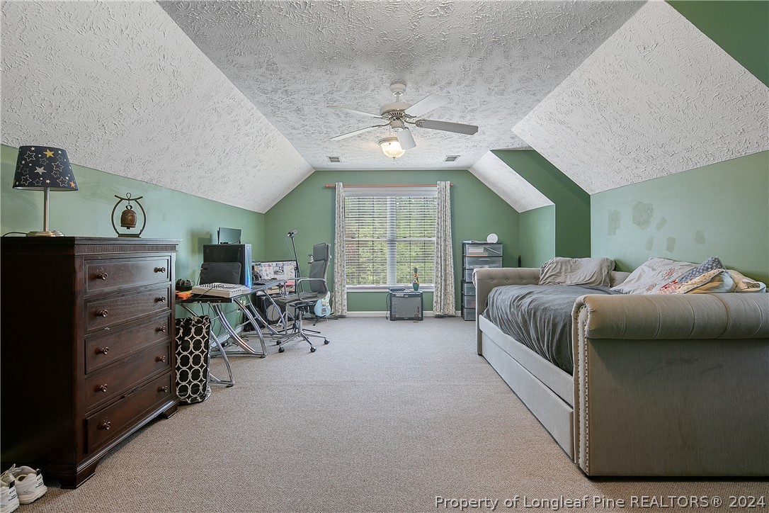 7833 Shuttle Road Fayetteville, NC 28311 - Photo 38 of 46 a bed room with a bed and a large window