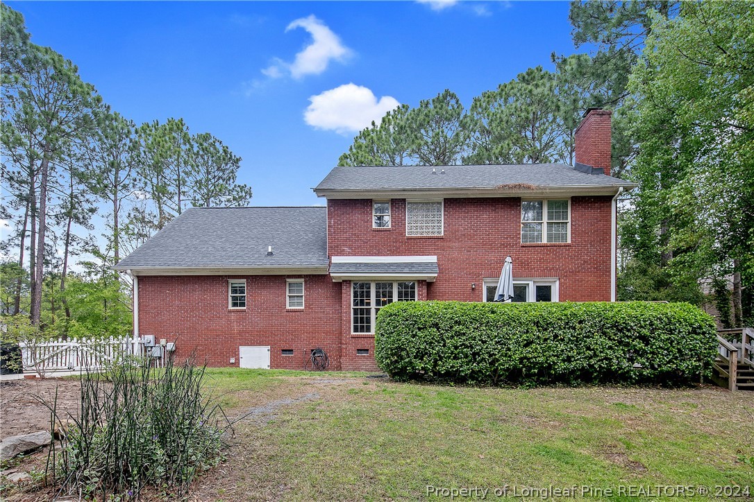 7833 Shuttle Road Fayetteville, NC 28311 - Photo 40 of 46 a front view of a house with a yard