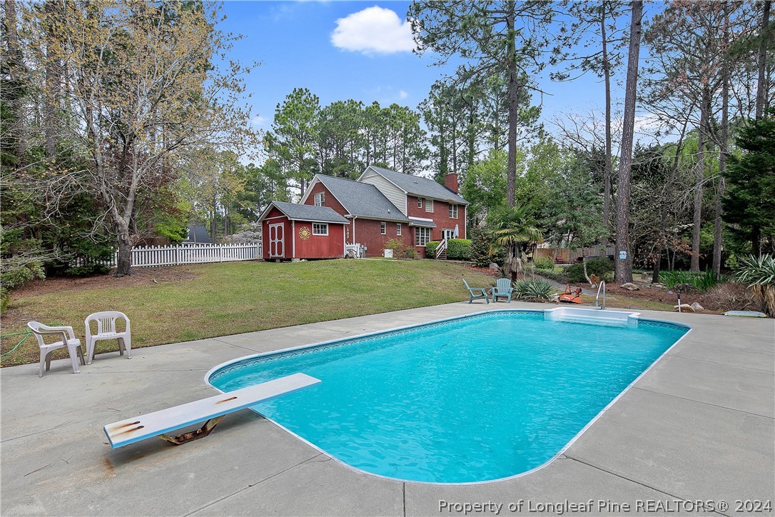 7833 Shuttle Road Fayetteville, NC 28311 - Photo 44 of 46 an aerial view of a house with swimming pool and patio