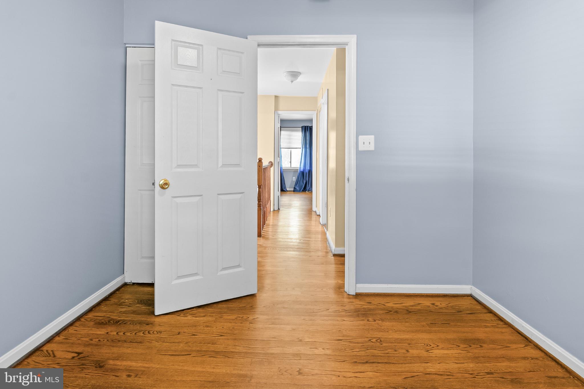 11 Strabane Court Baltimore, MD 21234 - Photo 31 of 45 Inviting hallway with warm tones.