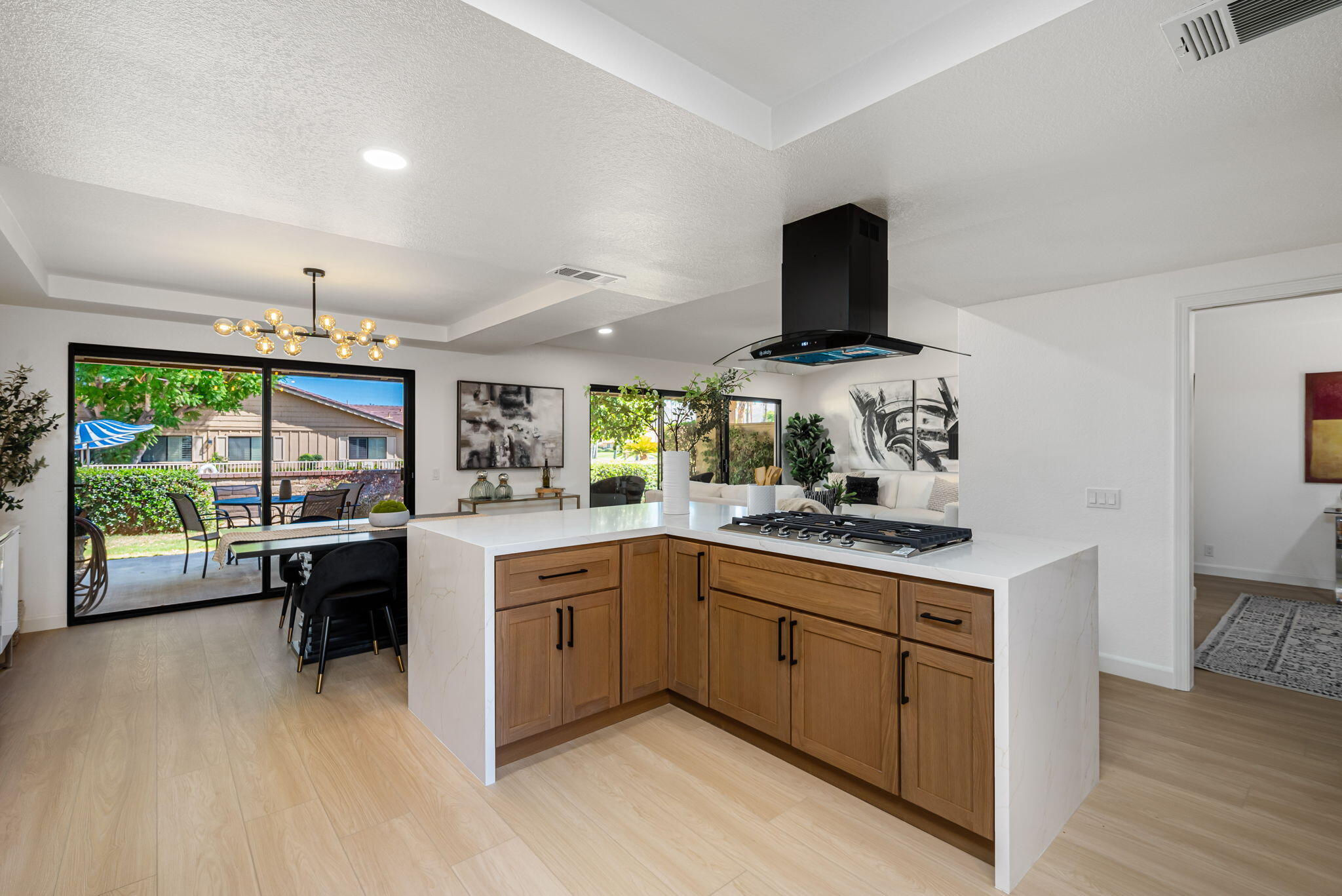 4 Maximo Way Palm Desert, CA 92260 - Photo 17 of 51 a kitchen with stainless steel appliances granite countertop a stove and a sink
