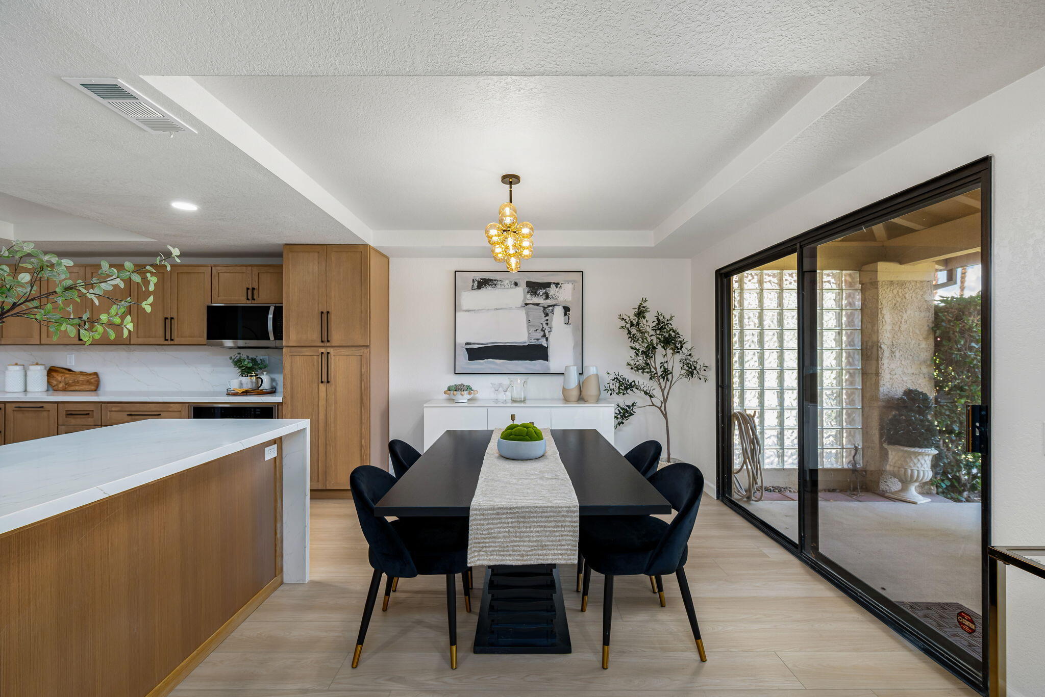 4 Maximo Way Palm Desert, CA 92260 - Photo 21 of 51 a view of a dining room with furniture window and outside view