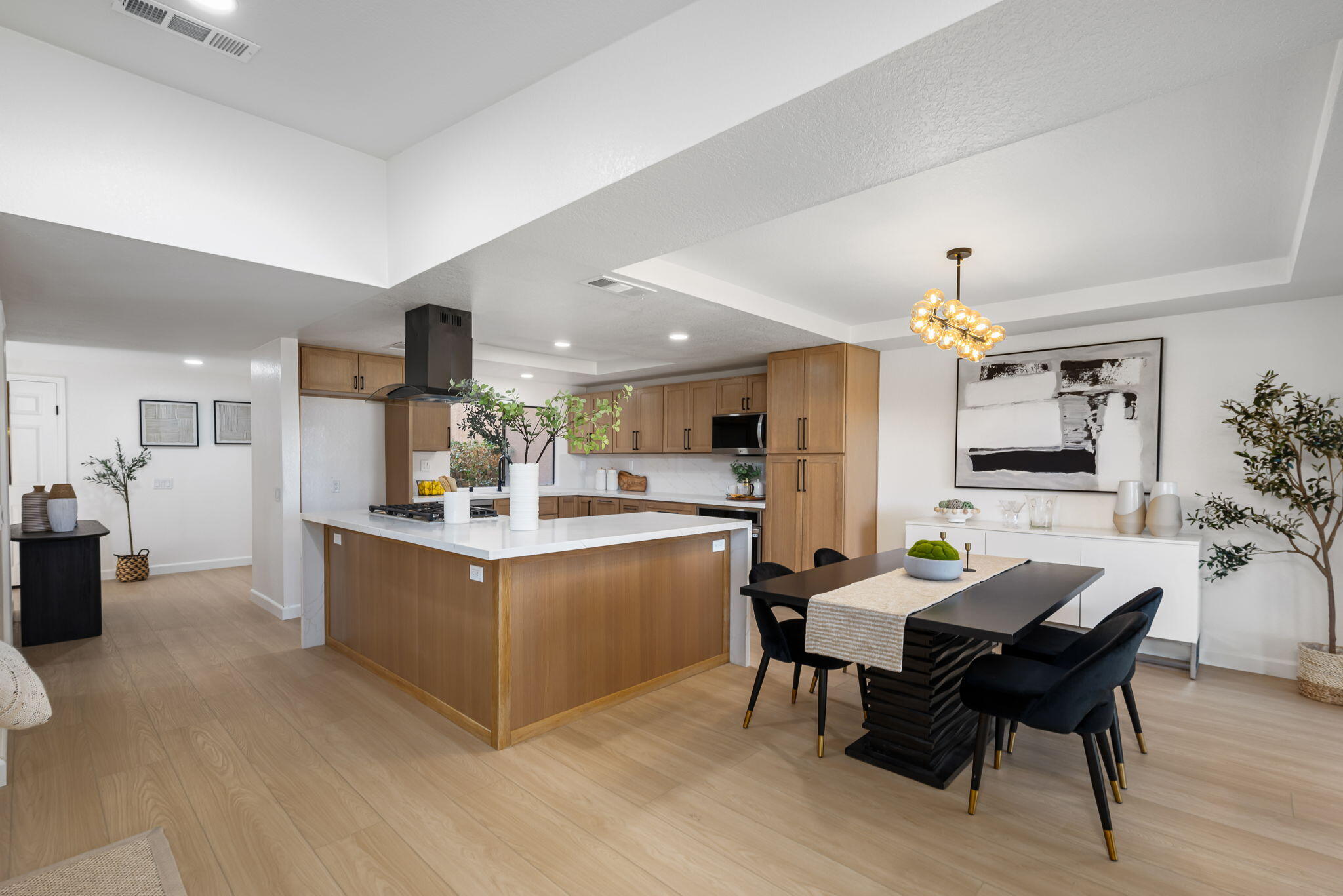 4 Maximo Way Palm Desert, CA 92260 - Photo 22 of 51 a living room with stainless steel appliances kitchen island granite countertop furniture and wooden floor
