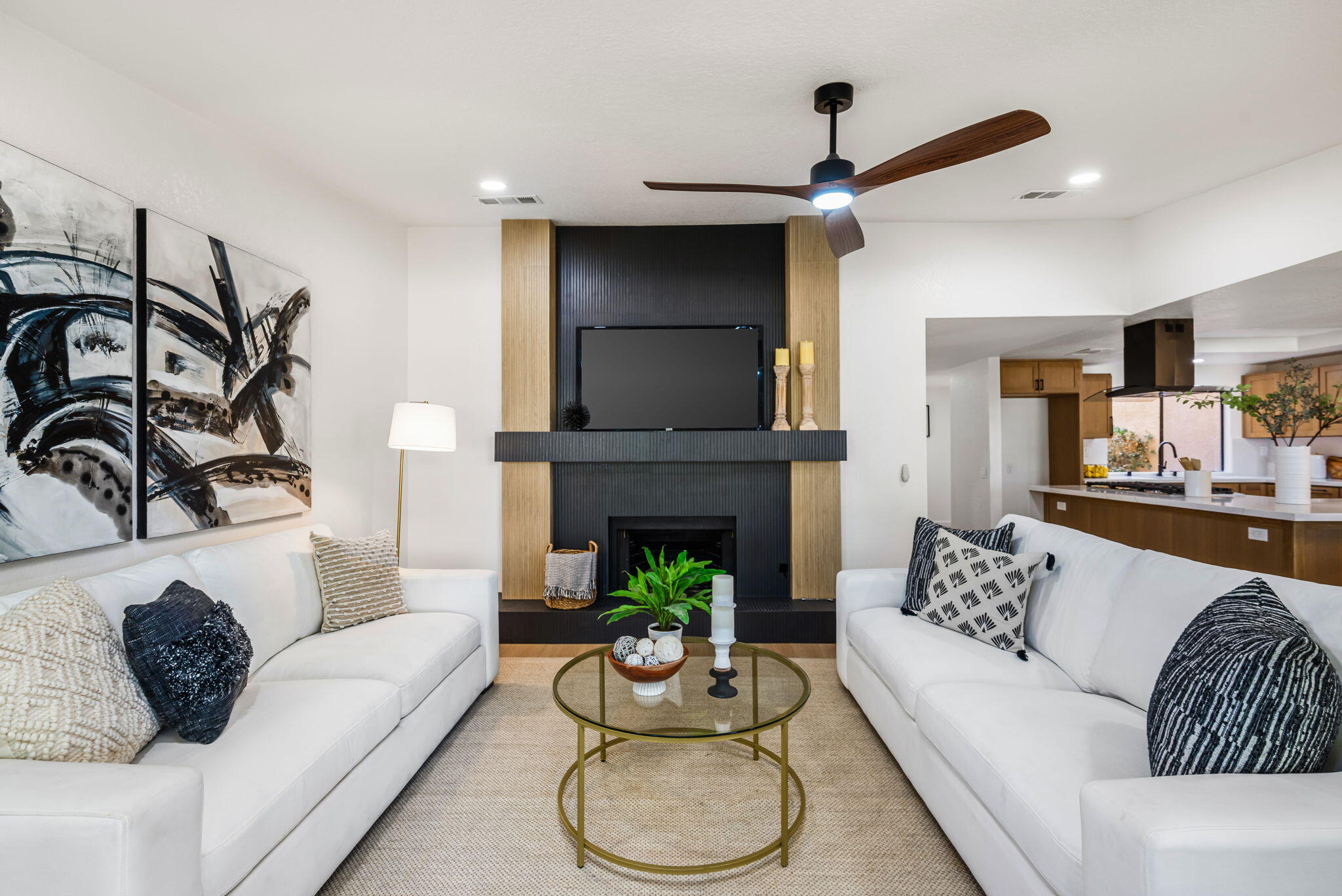 4 Maximo Way Palm Desert, CA 92260 - Photo 26 of 51 a living room with furniture and a fireplace