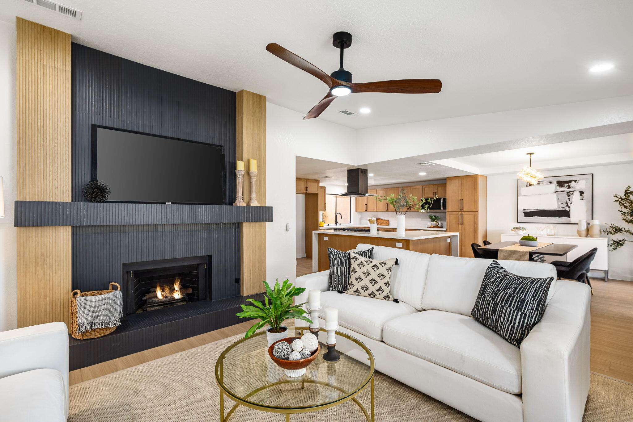 4 Maximo Way Palm Desert, CA 92260 - Photo 27 of 51 a living room with furniture and a fireplace