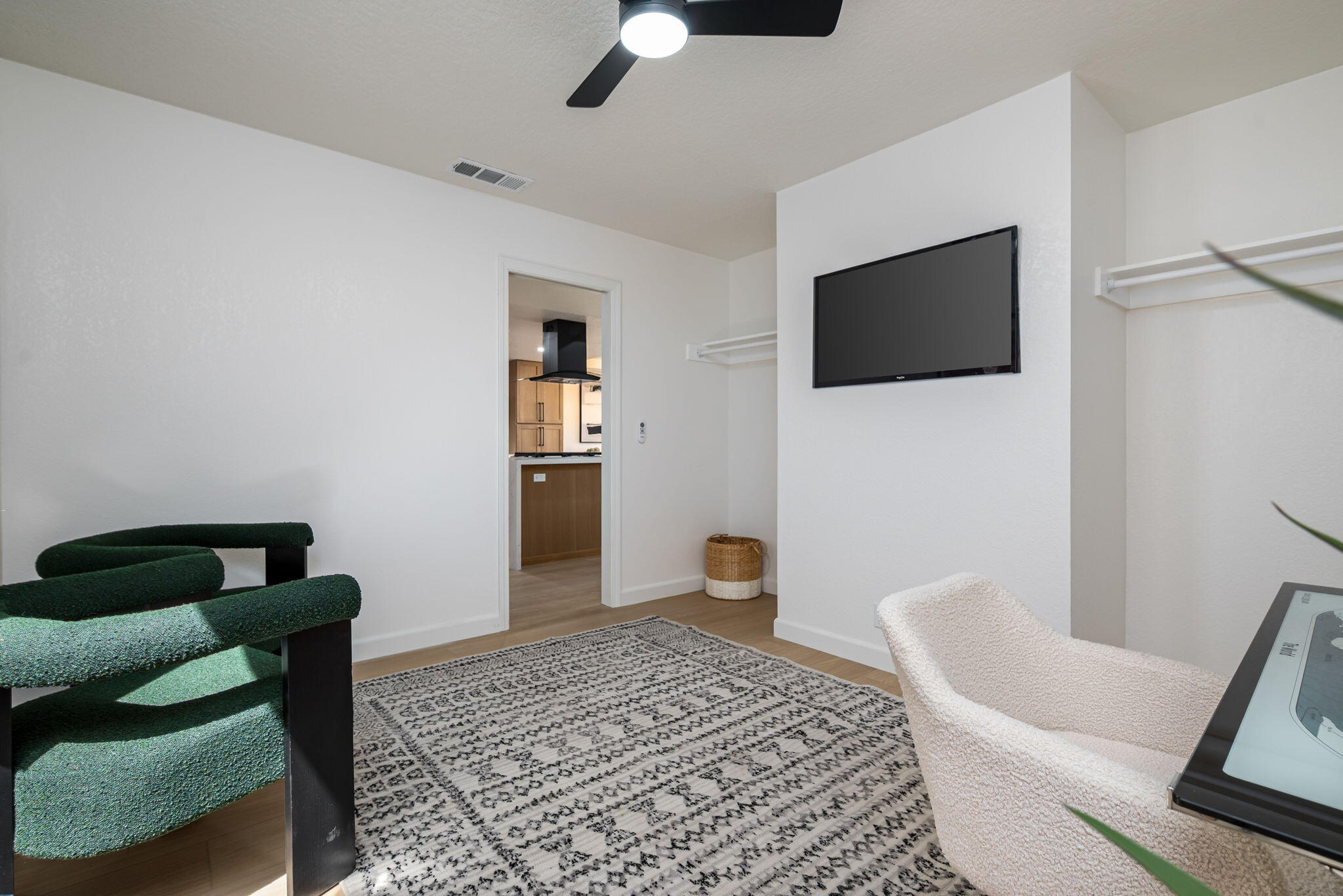 4 Maximo Way Palm Desert, CA 92260 - Photo 36 of 51 a living room with furniture and a flat screen tv