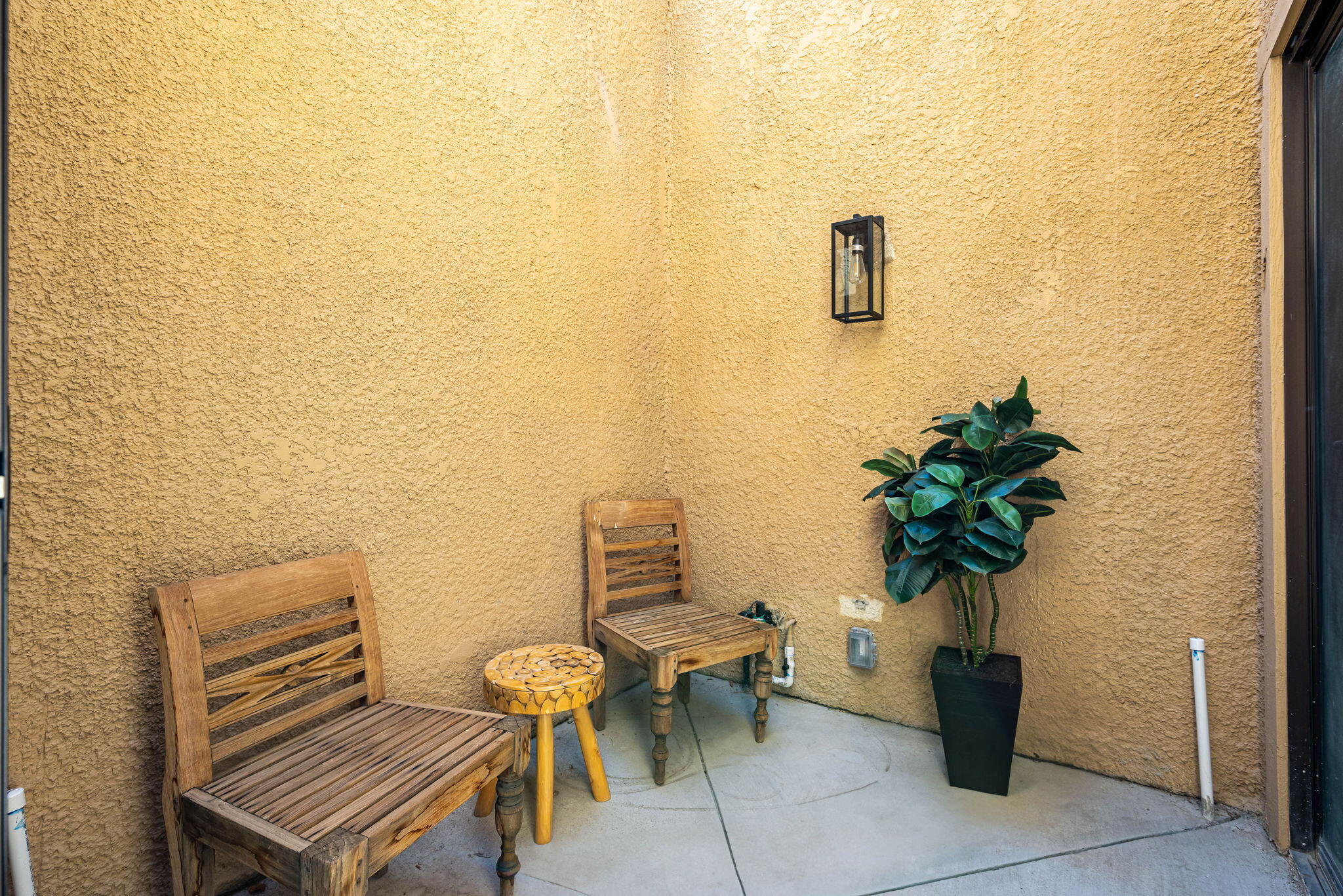 4 Maximo Way Palm Desert, CA 92260 - Photo 37 of 51 a view of a room with chairs and potted plant