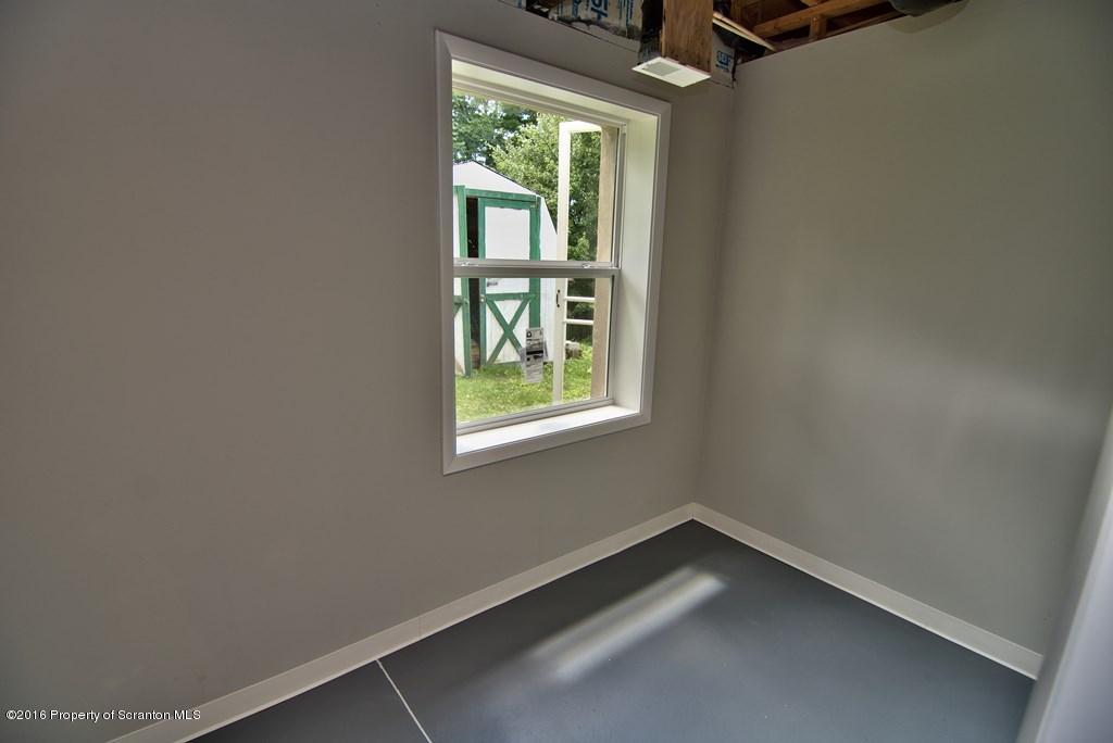 2131 Madisonville Road Moscow, PA 18444 - Photo 38 of 49 an empty room with a window
