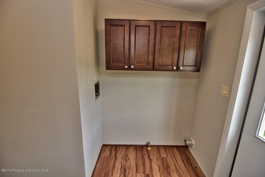 2131 Madisonville Road Moscow, PA 18444 - Photo 9 of 49 a view of walk in closet with wooden floor