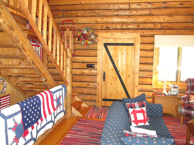 6210 Mountain View Road, Unit 133 Coalville, UT 84017 - Photo 16 of 87 Inside the front door is the great room and log stairway to the loft bedroom.