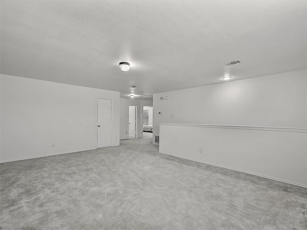 2549 Saddlehorn Drive Little Elm, TX 75068 - Photo 15 of 23 a view of empty room