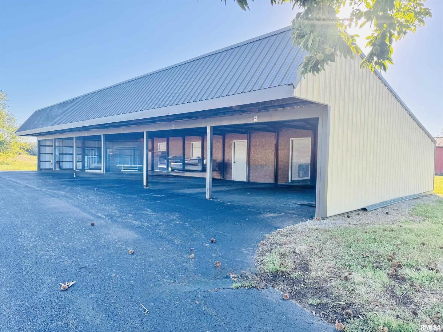 965 Goreville Road, Unit 16 Goreville, IL 62939 - Photo 12 of 29 a view of a house with a backyard