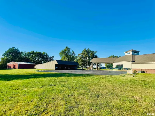 a view of an outdoor space and tennis court