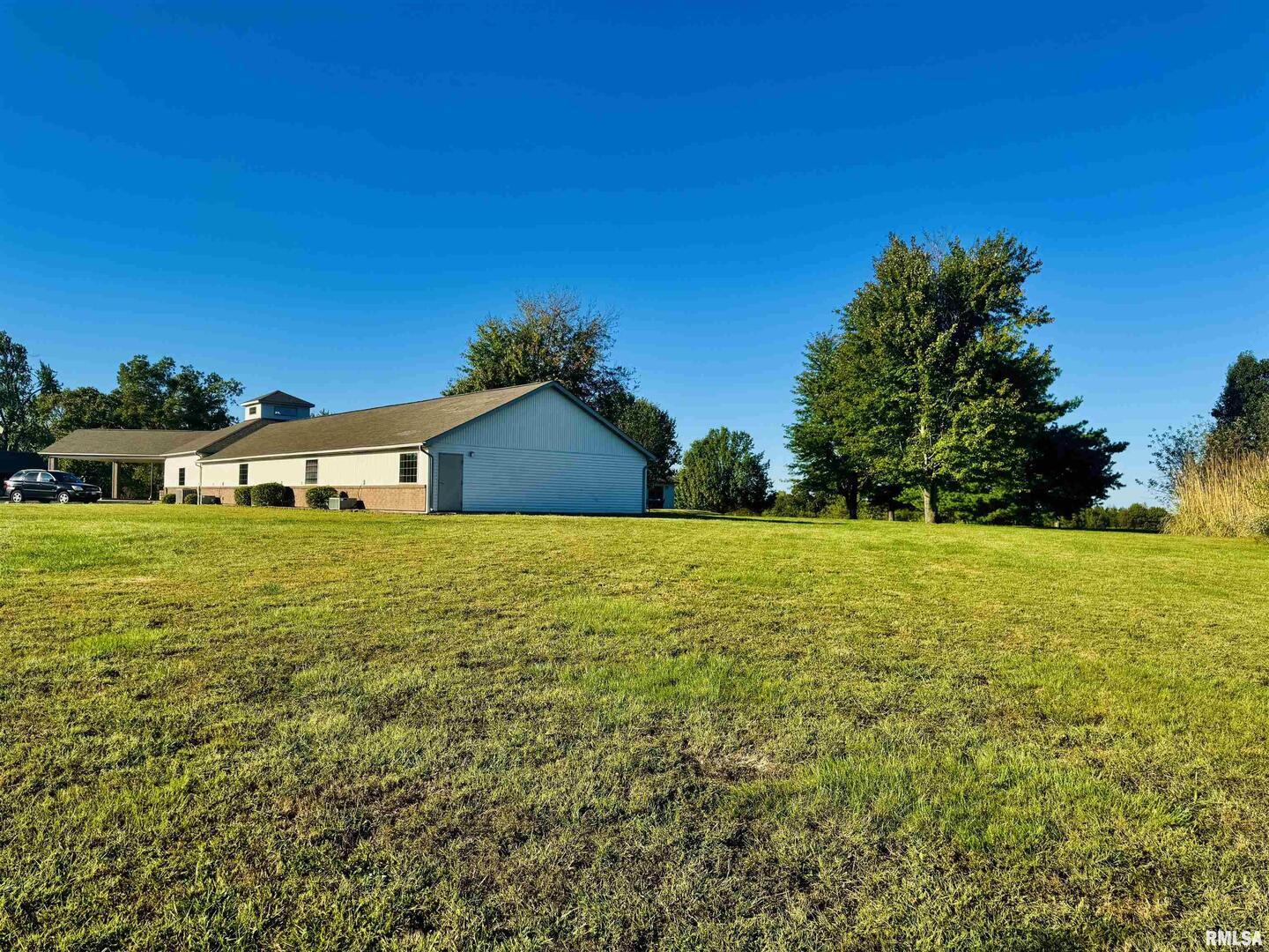 965 Goreville Road, Unit 16 Goreville, IL 62939 - Photo 16 of 29 a view of a house with a yard