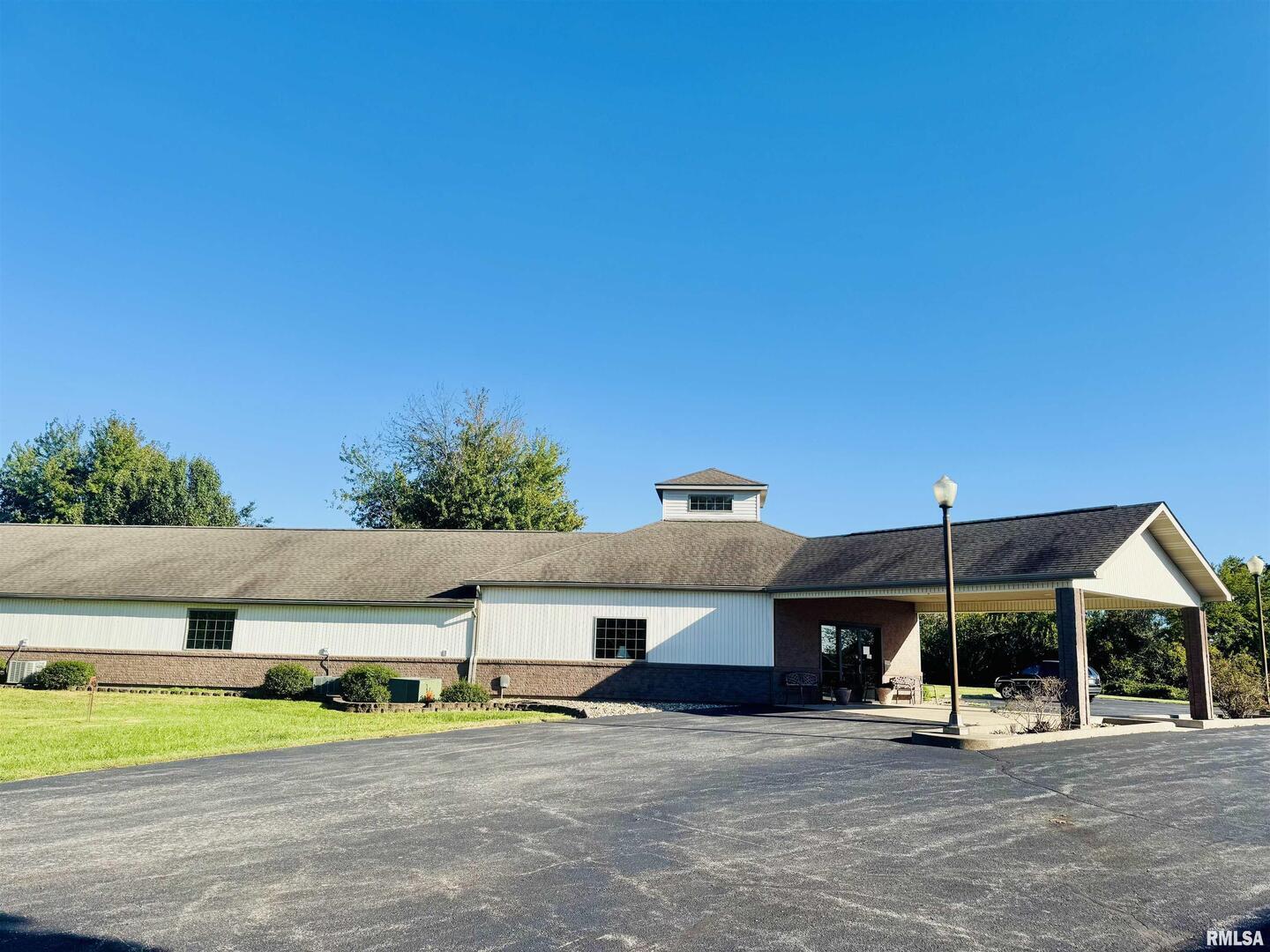 965 Goreville Road, Unit 16 Goreville, IL 62939 - Photo 2 of 29 a view of a house with a patio and a yard