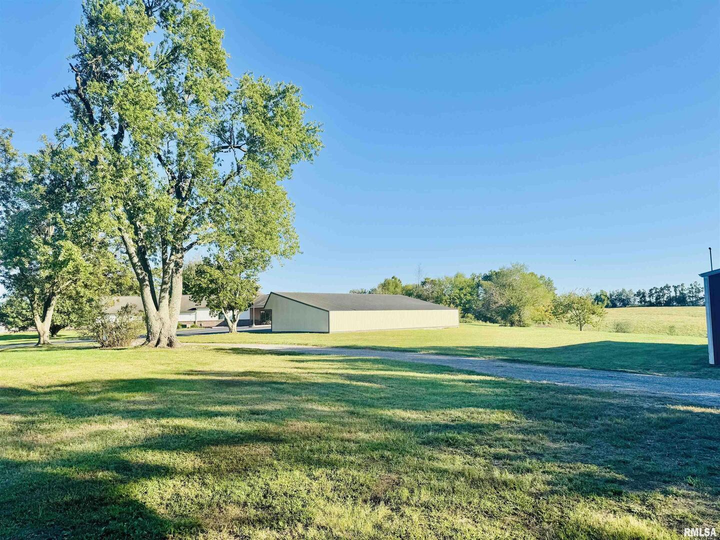 965 Goreville Road, Unit 16 Goreville, IL 62939 - Photo 21 of 29 a view of a big yard with plants and large trees