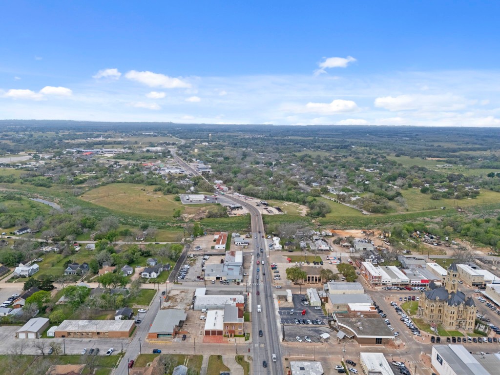 104 Kessler Street Hallettsville, TX 77964 - Photo 13 of 18 an aerial view of city and lake