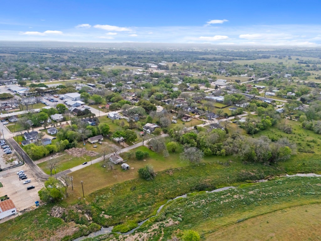 104 Kessler Street Hallettsville, TX 77964 - Photo 4 of 18 an aerial view of residential houses with outdoor space and trees