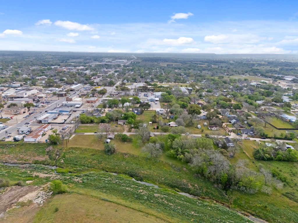104 Kessler Street Hallettsville, TX 77964 - Photo 5 of 18 an aerial view of residential houses with outdoor space and lake view