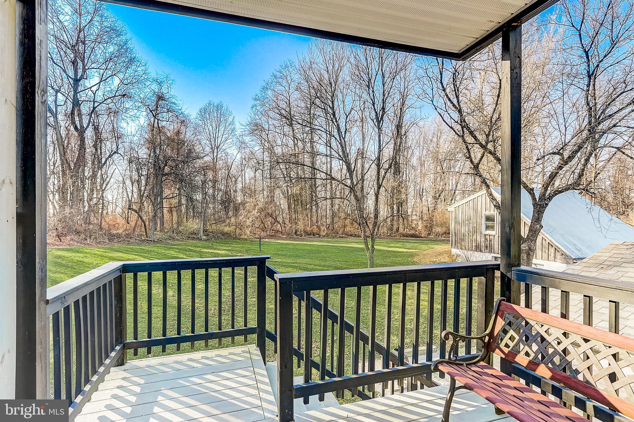 100 Diamond Rock Road Phoenixville, PA 19460 - Photo 28 of 49 View from upstairs Primary Bedroom covered porch